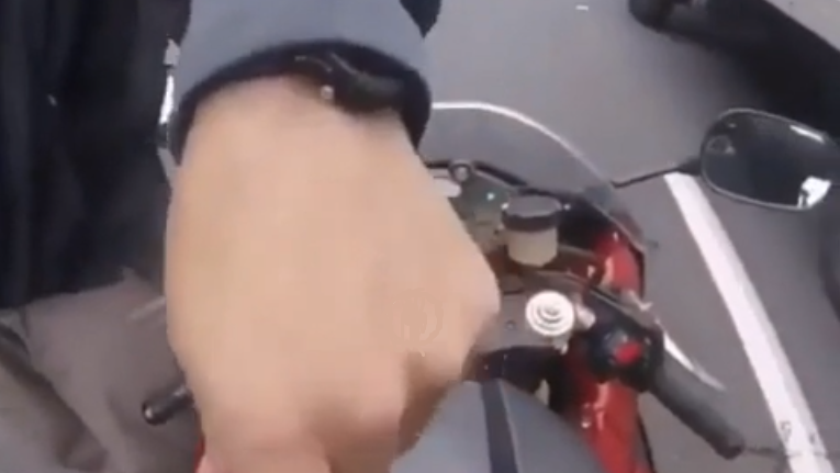 off-duty officer pulls a gun on an unsuspecting biker